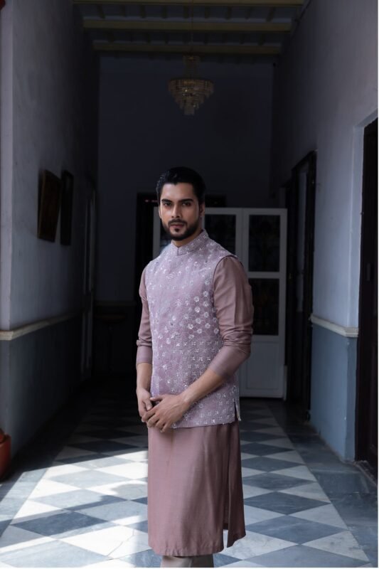 Radian, a dark pink Nehru jacket set with threadwork embroidery